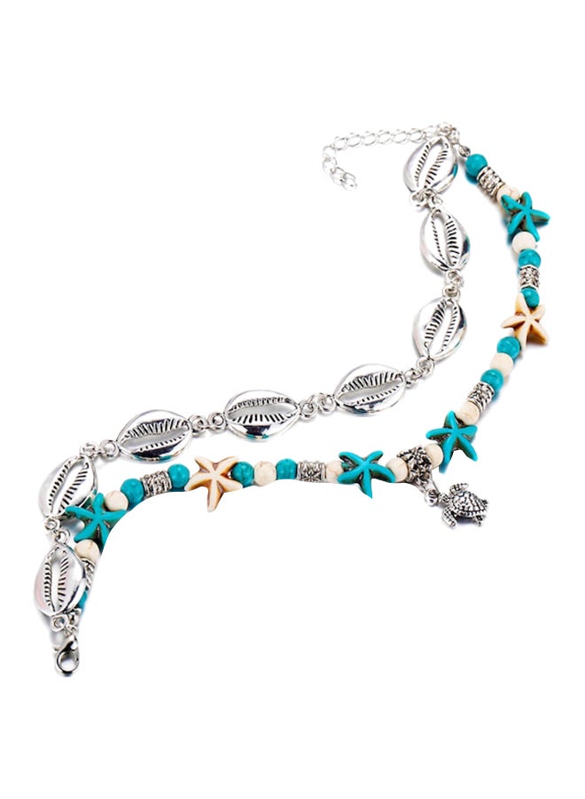 طقم خلخال بسلسلة مصنوع من سبيكة معدنية بتصميم كلاسيكي مزين بأصداف من المعدن مكون من قطعتين