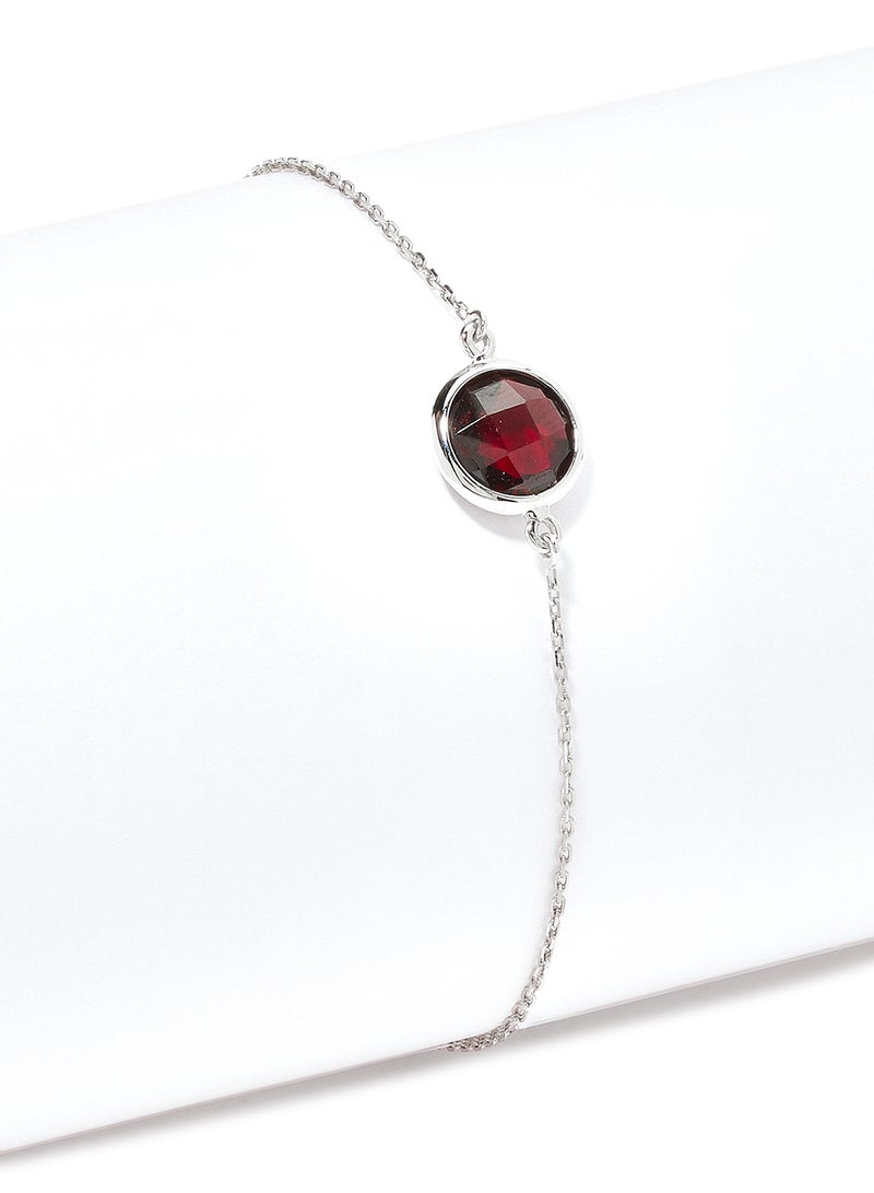 Capri Gold - 18 Karat White Gold Garnet Single Stone Bracelet - Image 1