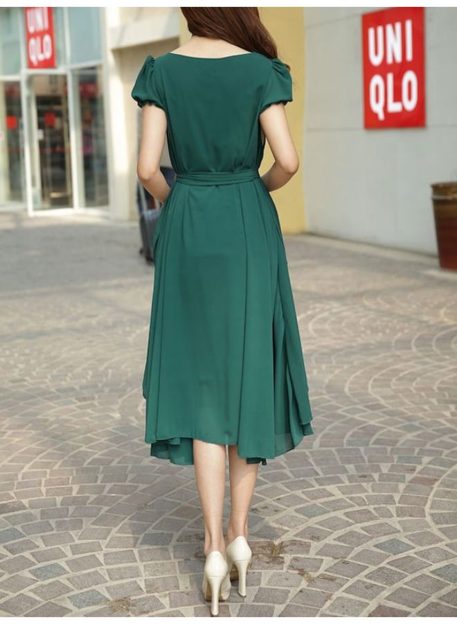 فستان عصري متوسط الطول بتصميم سادة ورقبة مستديرة وقصة غير متماثلة أخضر - Image 2