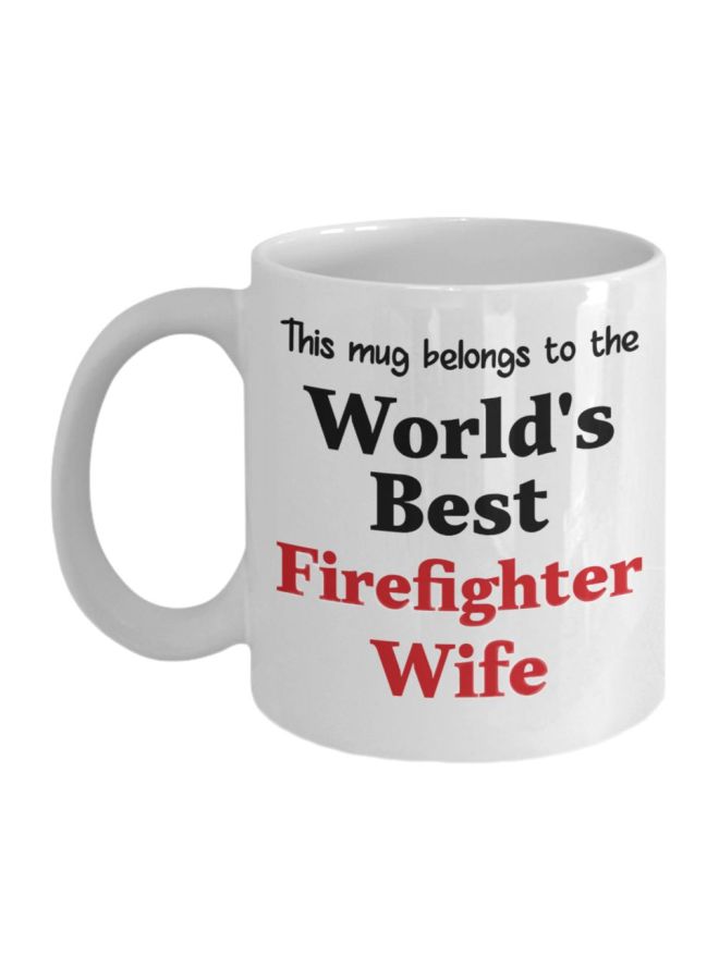 مج قهوة مطبوع عليه عبارة "This Mug Belongs To The World's Best Firefighter Wife" أبيض/أسود/أحمر 325ملليلتر