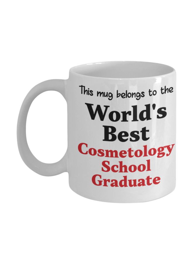 مج قهوة مزين بطبعة "World's Best Cosmetology School Graduate" أبيض/أسود/أحمر