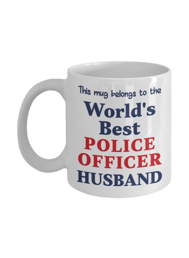 مج قهوة مطبوع عليه عبارة "World's Best Police Officer Husband" أبيض/أزرق/أحمر 8x9.5x8سم
