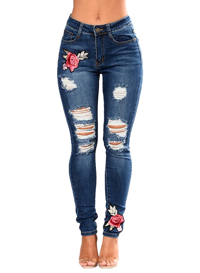 بنطال جينز ضيّق بتصميم ممزق ومطرز بنقشة زهور أزرق - Image 1