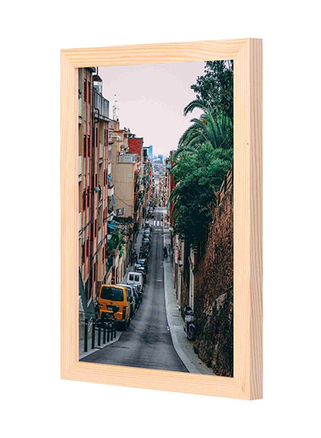 لوحة جدارية بتصميم طريق بين أبنية متعدد الألوان 23x33x2سم - Image 1