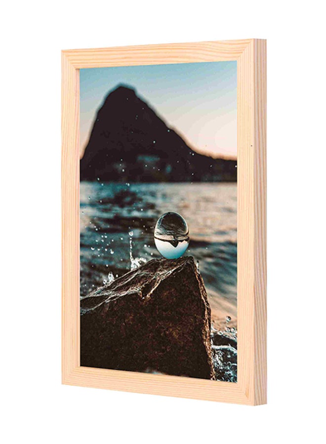 LOWHA Shallow Focus Glass Ball Near Body Of Water Printed Wall Painting Multicolour 23x33x2cm - Image 1