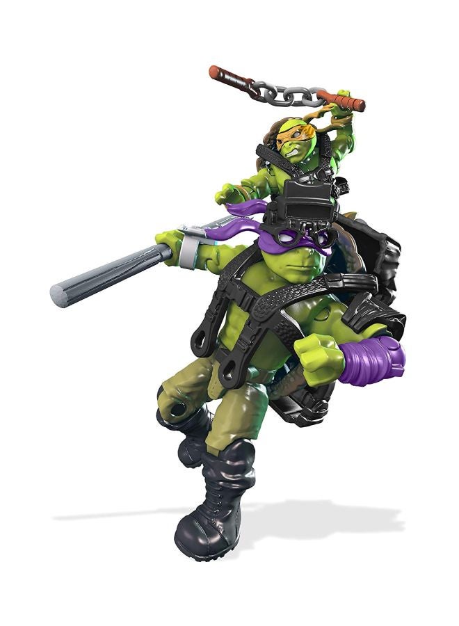 ميجا بلوكس طقم قطع بناء شاحنة معركة من فيلم Mutant Ninja Turtles Out Of The Shadows من 413 قطعة طراز DPF82 DPF82 أكبر من 8 سنوات  - Image 5