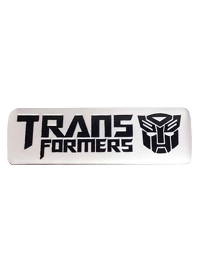 شارة ثلاثية الأبعاد بتصميم شعار فيلم "Transformers"