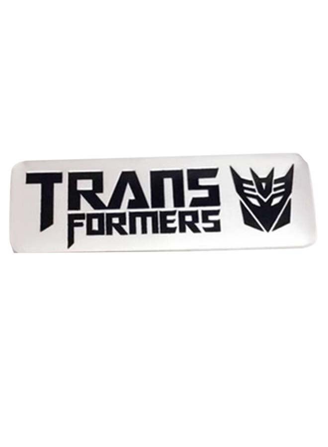 "شارة ثلاثية الأبعاد بتصميم شعار فيلم "Transformers"