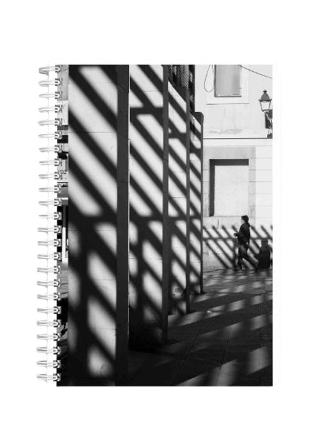 LOWHA Man Wearing Pullover Hoodie Near Wall A5 Spiral Bound Notebook Black/Grey  - Image 1