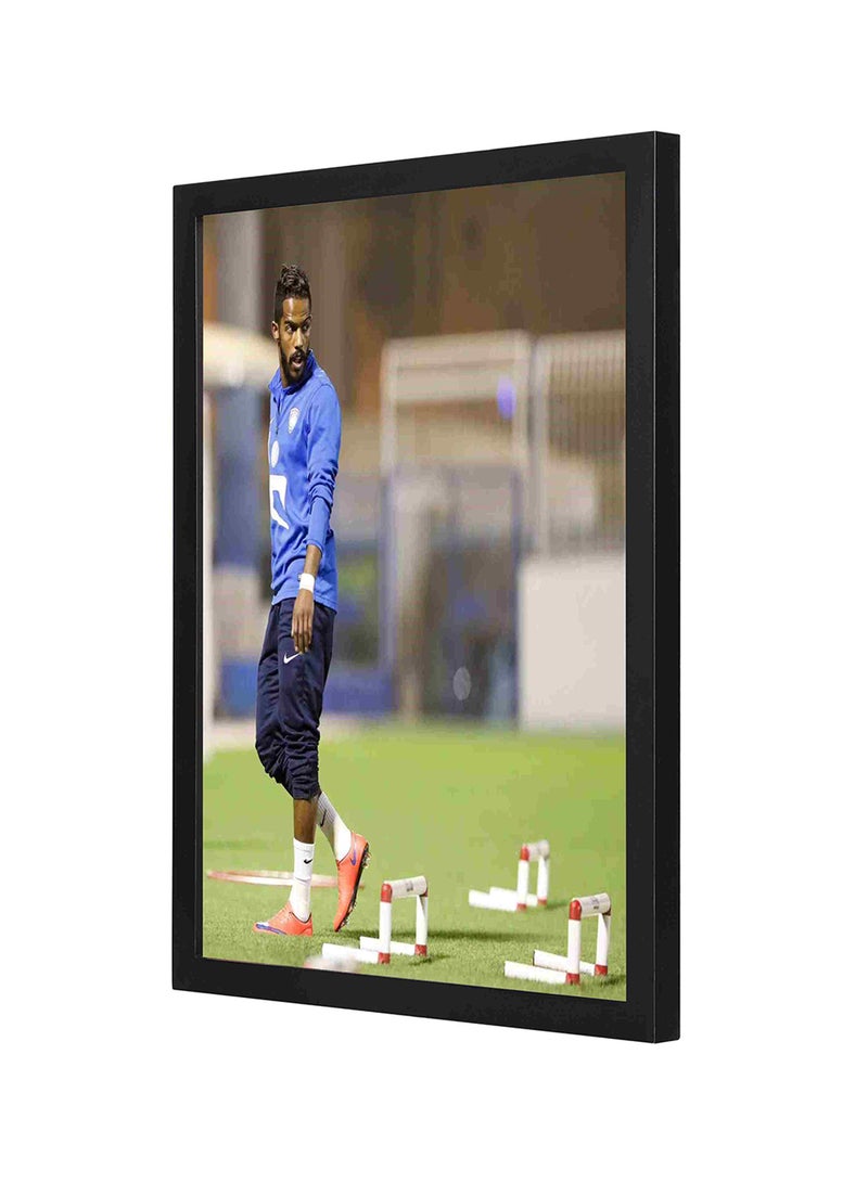 لوحة فنية من الخشب بطبعة لاعب كرة القدم نواف العابد متعدد الألوان 33 x 43سم - Image 1