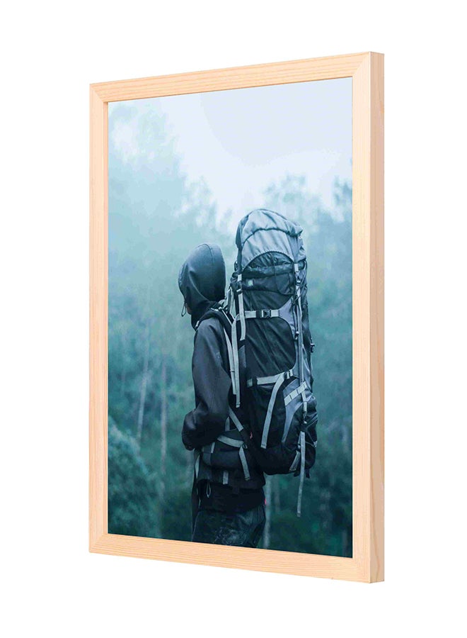 LOWHA Man Wearing Hoodie Carries Bag Wooden Frame Wall Art Multicolour 33 x 43cm