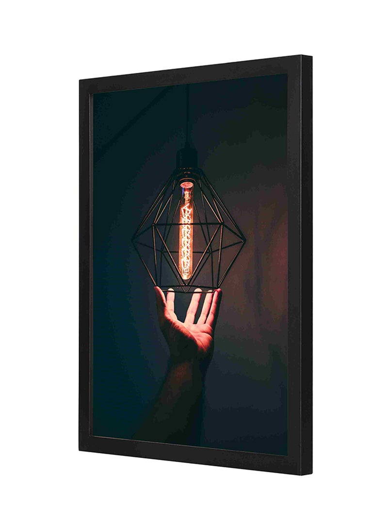 لوحة فنية جدارية بإطار خشبي بتصميم مصباح متدلي متعدد الألوان 33x43سم - Image 1