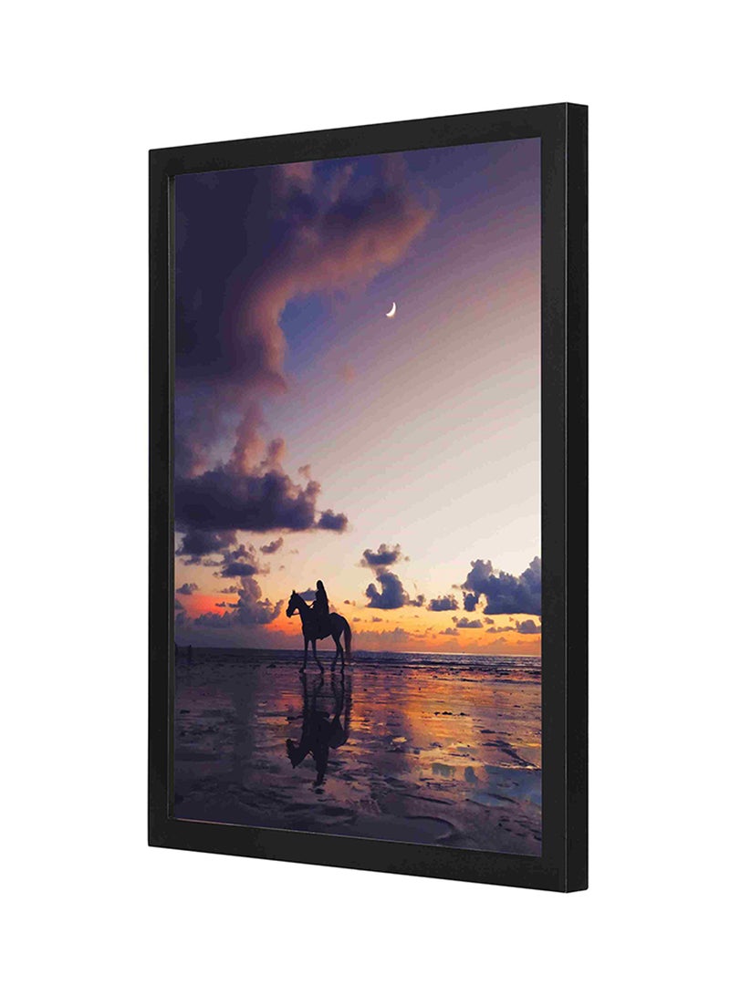 لوحة فنية جدارية تمثل شخصاً يركب حصاناً ومزودة بإطار خشبي متعدد الألوان 33 x 43سم - Image 1