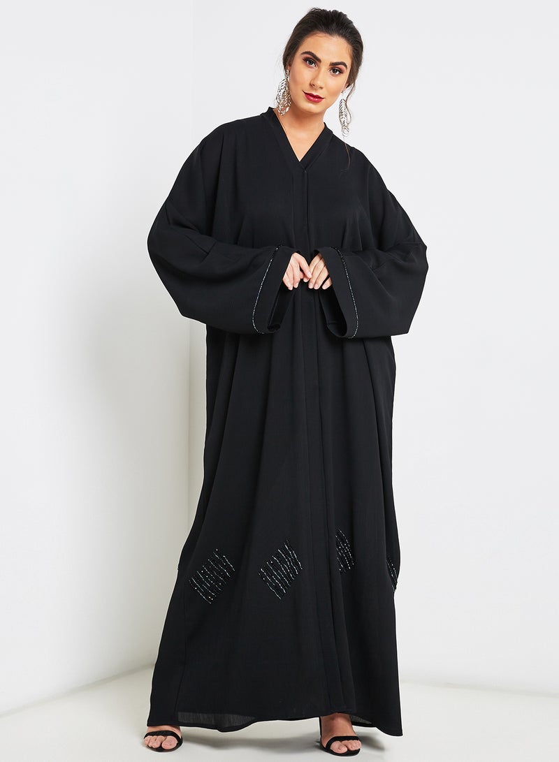 NUKHBAA - Embroidered Bell Sleeves Abaya Black - Image 1