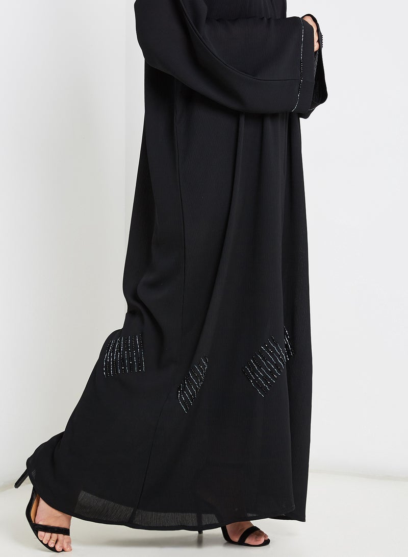 NUKHBAA - Embroidered Bell Sleeves Abaya Black - Image 1