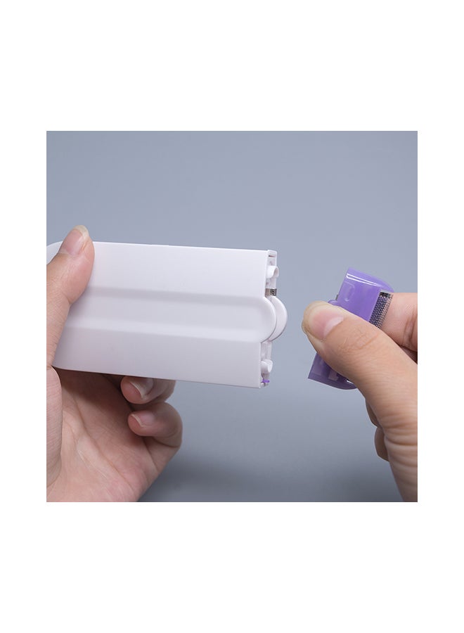 ماكينة إزالة الشعر بدون ألم تعمل باللمس وقابلة للشحن بنفسجي/أبيض 13x2x8سم - Image 3
