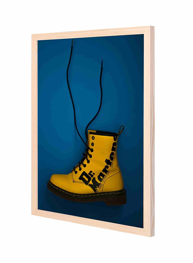 لوحة فنية بإطار خشبي بطبعة حذاء بوت واحد برباط مطبوع بكلمة "Dr. Martens"، لون أصفر أزرق/أصفر 43 x 53سم