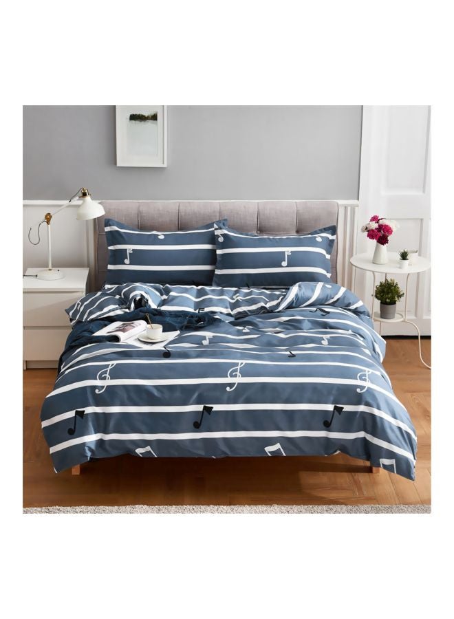 4-Piece Printed Quilt Set Combination Blue/White/Black  - Image 1