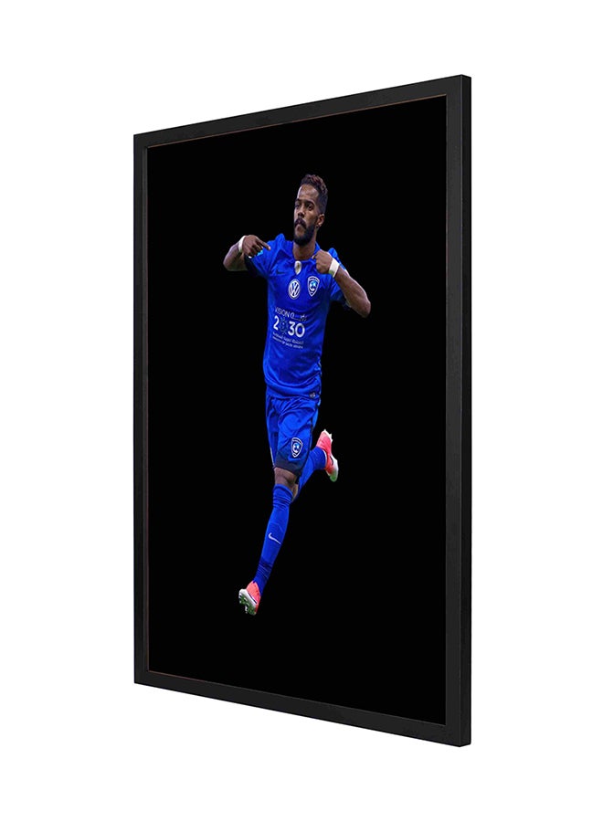 لوحة فنية جدارية بإطار بتصميم لصورة اللاعب نواف العابد متعدد الألوان 53 x 73سم