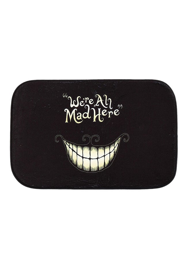 دواسة باب مضادة للانزلاق مطبوع عليها عبارة "Were All Mad Here" أسود/ أبيض 40 x 60سم 