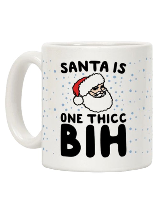"قدح قهوة مطبوع عليه عبارة "Santa Is One Thicc Bih Parody" أبيض/ أسود