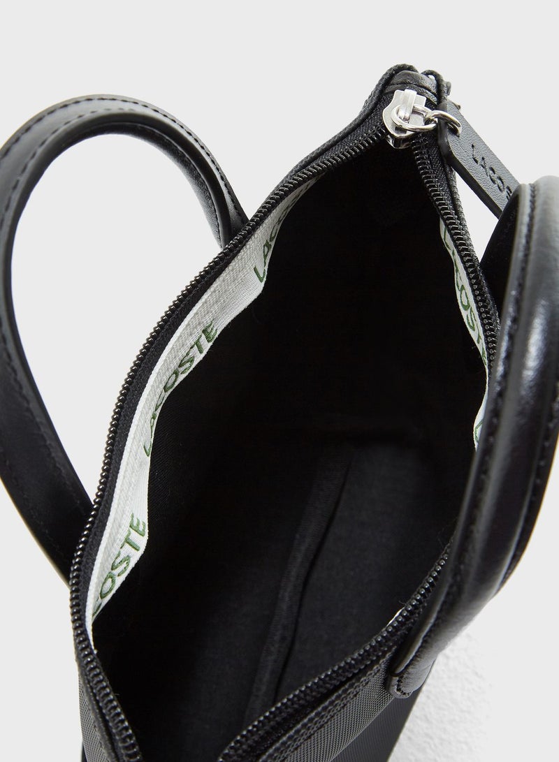 LACOSTE - Extra Small Top Handle Belted Crossbody Bag Black - Image 1