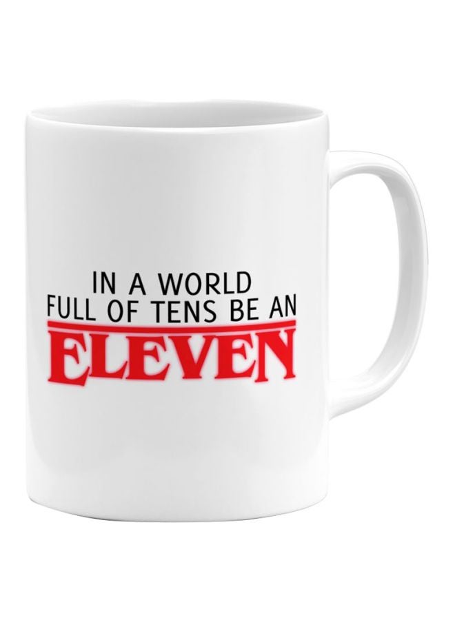 مج قهوة بطبعة كلمة "Eleven" أبيض/أسود/أحمر
