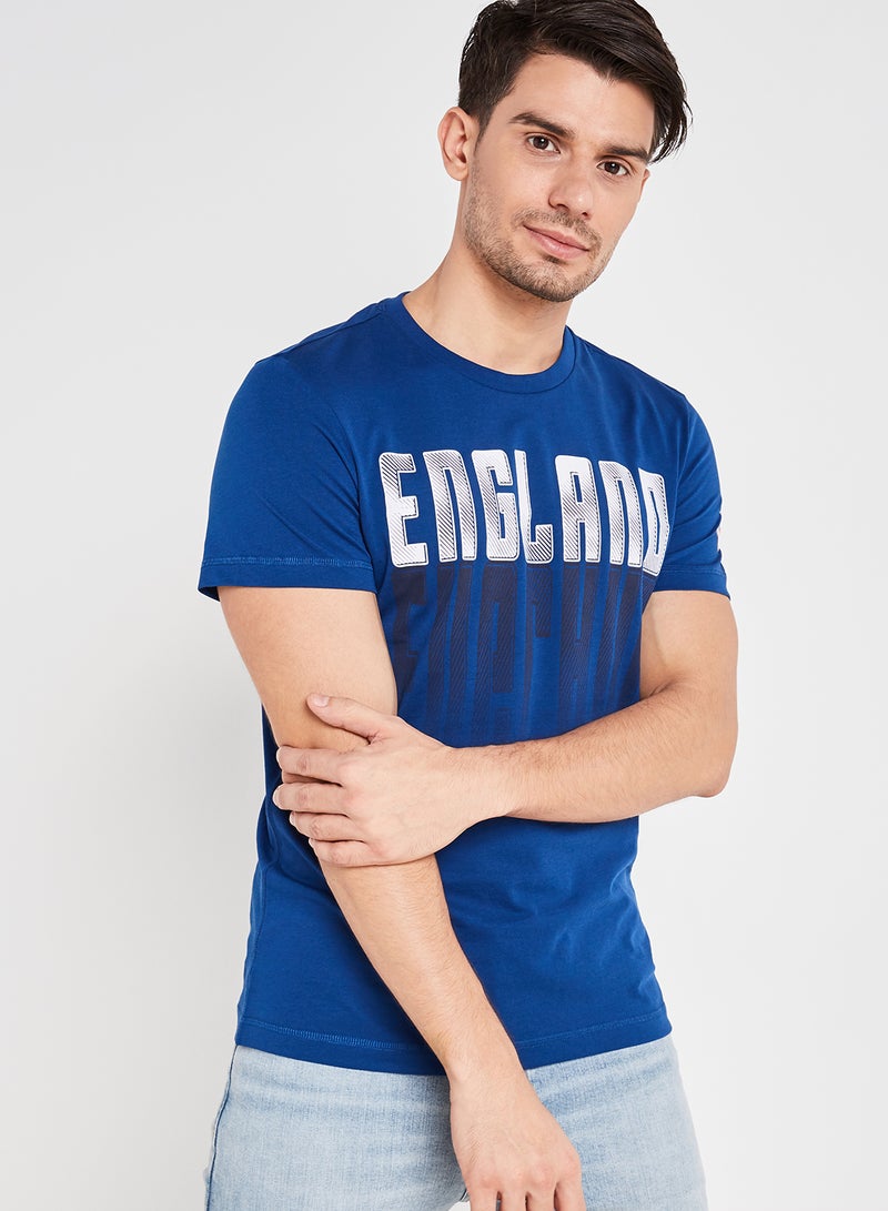 لوتو تيشيرت L73 III بطبعة علم أزرق - Image 1