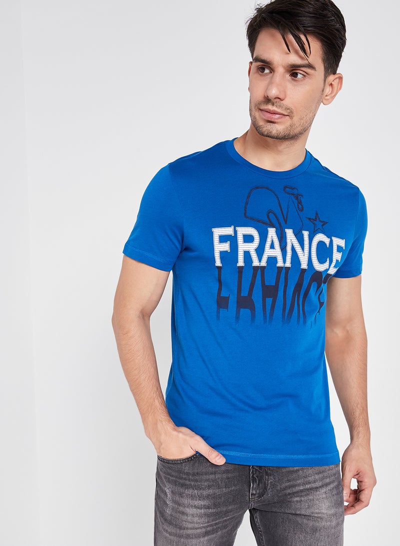 لوتو تيشيرت L73 III بطبعة علم أزرق - Image 1