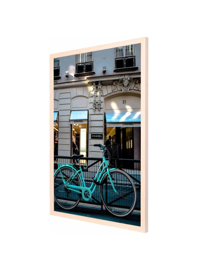 لوحة فنية بإطار لديكور الحائط برسمة دراجة بخارية متوقفة بالقرب من متجر شانيل أخضر / أبيض / أسود 53x73سم - Image 1