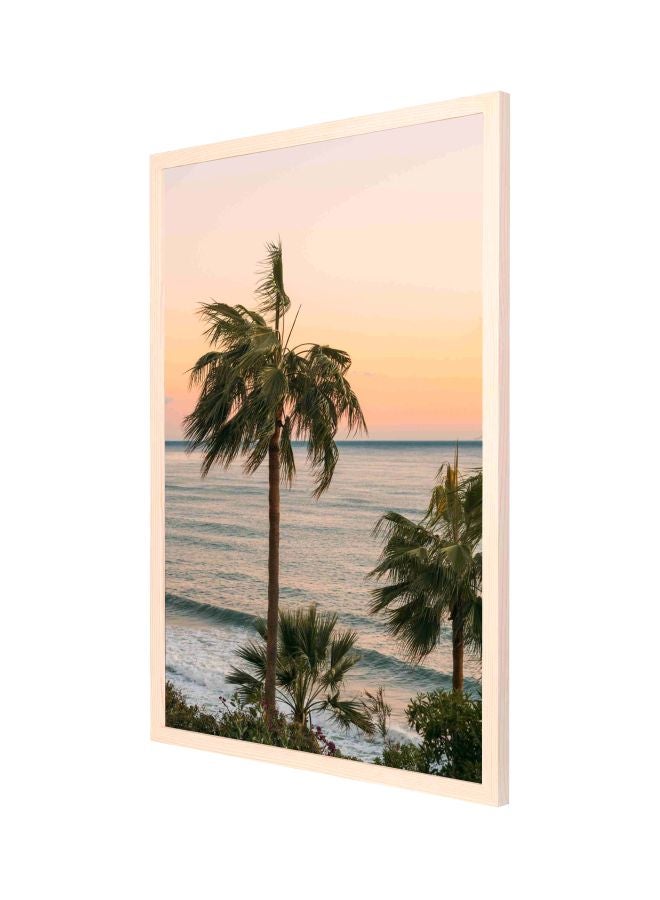 لوحة جدارية مطبوع عليها شجرة نخيل قريبة من الماء مزودة بإطار أخضر / أزرق/ أصفر 53x73Ø³Ù†ØªÙŠÙ…ØªØ± - Image 1