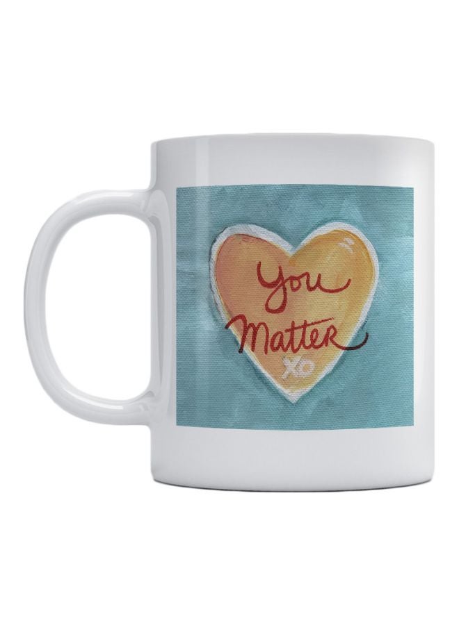 مج من السيراميك بطبعة عبارة "Love You Matter XO" أبيض/أزرق/بيج