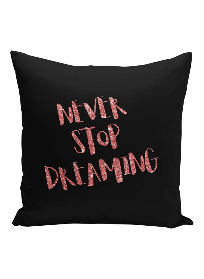 وسادة للزينة مطبوعة بعبارة "Never Stop Dreaming" أسود/وردي 16x16بوصة - Image 1