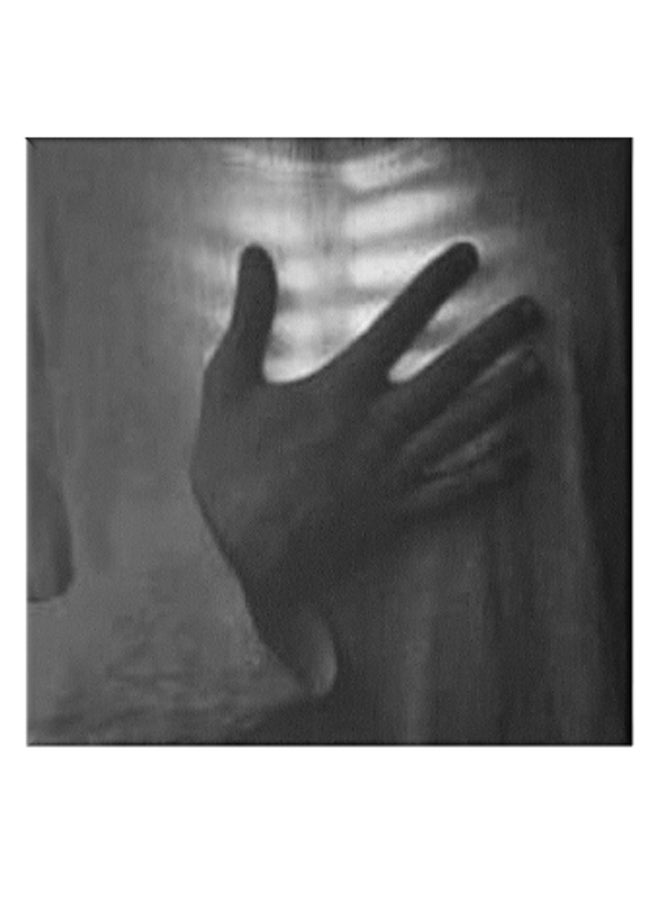 لوحة فنية من قماش الكانفاس بإطار مخفي لصورة رجل أسود/ أبيض/ رمادي 50 x 50سم - Image 1