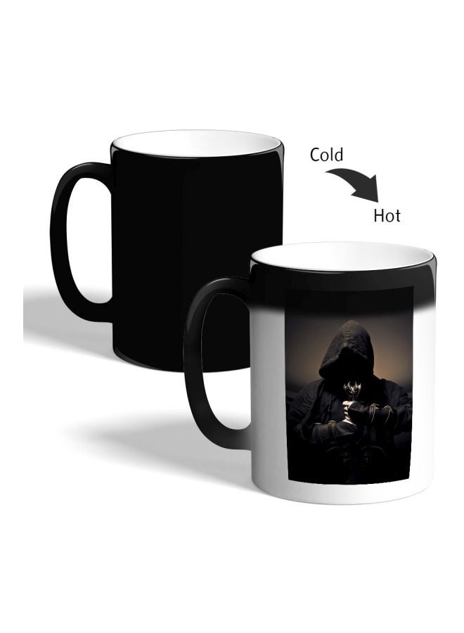 ديكالاك مج قهوة سحري بطبعة رجل غامض أسود 325ملليلتر - Image 2