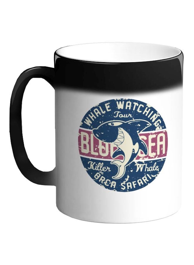 ديكالاك مج قهوة سحري بطبعة حوت أسود 325ملليلتر - Image 1