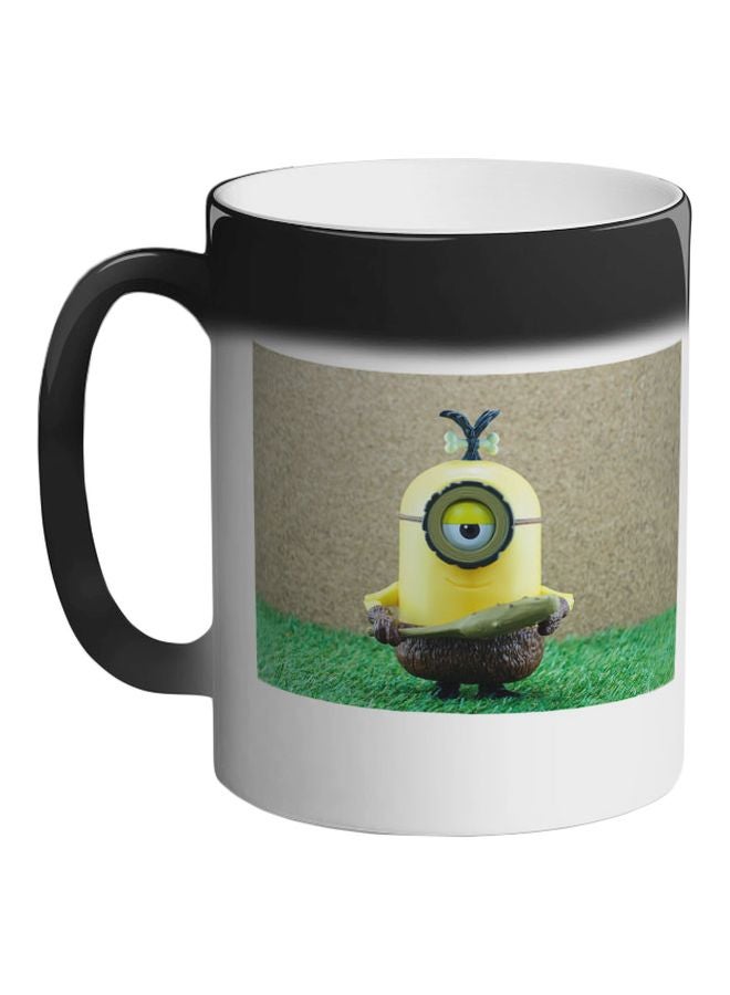 ديكالاك مج قهوة سحري بطبعة مينيونز أسود 325ملليلتر - Image 1