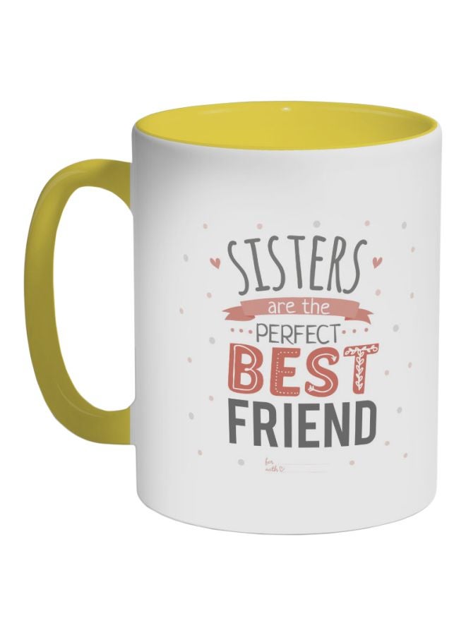 ديكالاك كوب قهوة مطبوع عليه عبارة "سيستيرز آر ذا بيرفيكت بيست فريند" أصفر/ أبيض/ أسود 325ملليلتر