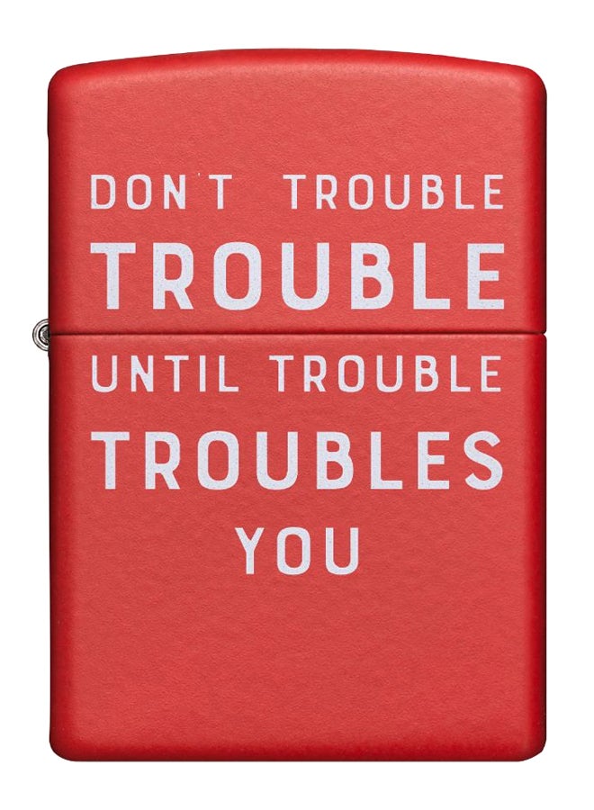 زيبو ولاعة تعمل بالغاز بطبعة كلمة Trouble 8.5 x 6سم - Image 1