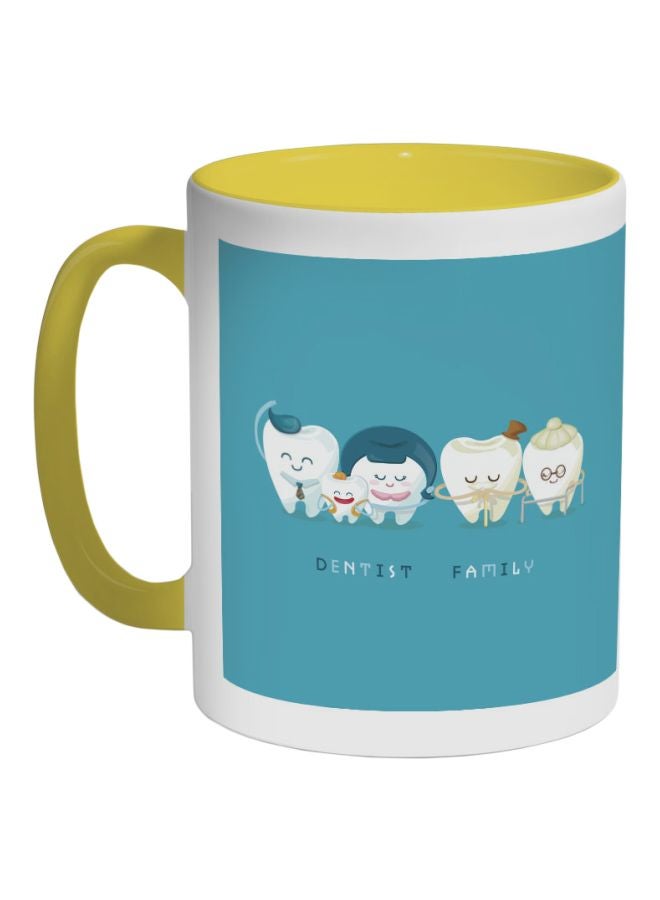 ديكالاك مج قهوة بطبعة أسنان وعبارة "Dentist Family" أصفر/أبيض/أزرق 325ملليلتر