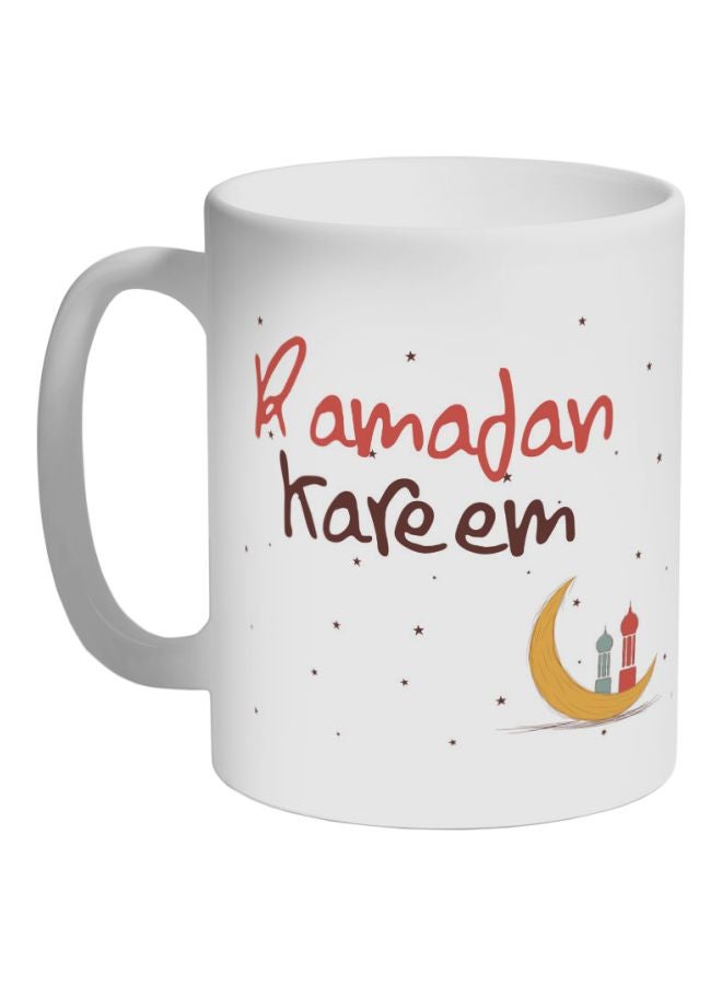 ديكالاك مج قهوة من السيراميك مزين بطبعة عبارة "رمضان كريم" أبيض/وردي/أصفر 325ملليلتر