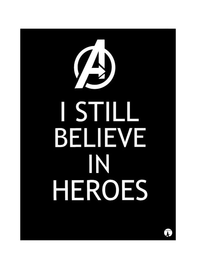 لوح للزينة من المعدن بطبعة عبارة "I Still Believe In Heroes" أسود/ أبيض 20x15سم