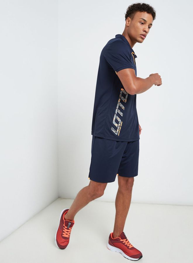 لوتو تيشيرت بولو ديفين أي في كحلي/برتقالي - Image 3