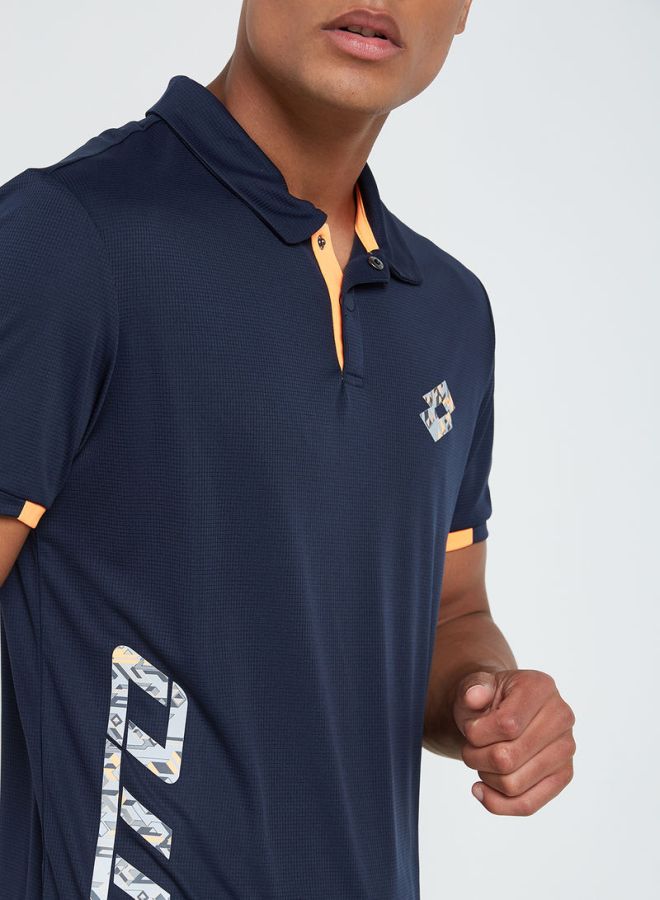 لوتو تيشيرت بولو ديفين أي في كحلي/برتقالي - Image 4