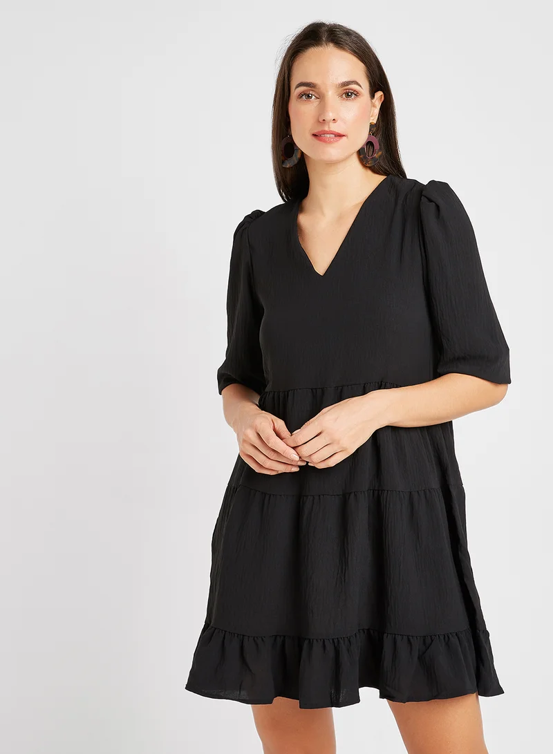 trendyol Solid Pattern Ruffled Hem Mini Dress Black