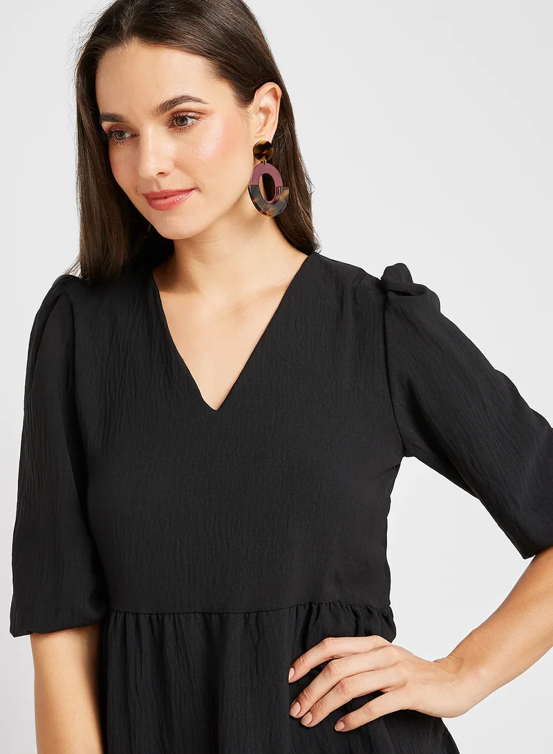trendyol Solid Pattern Ruffled Hem Mini Dress Black
