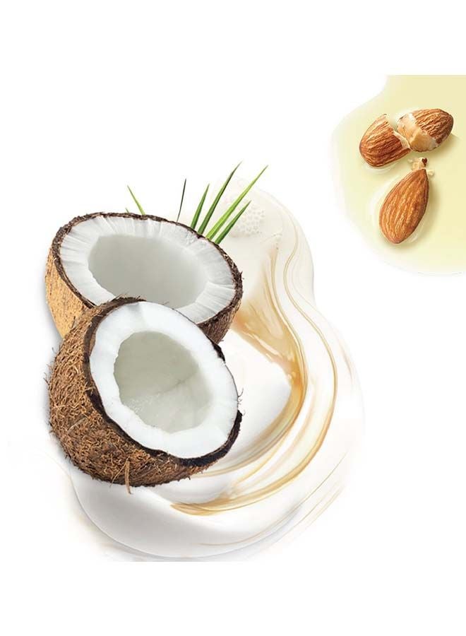 دوف لوشن الجسم نوريشينج سيكريتس بمستخلص جوز الهند لتجديد البشرة 250ملليلتر - Image 3