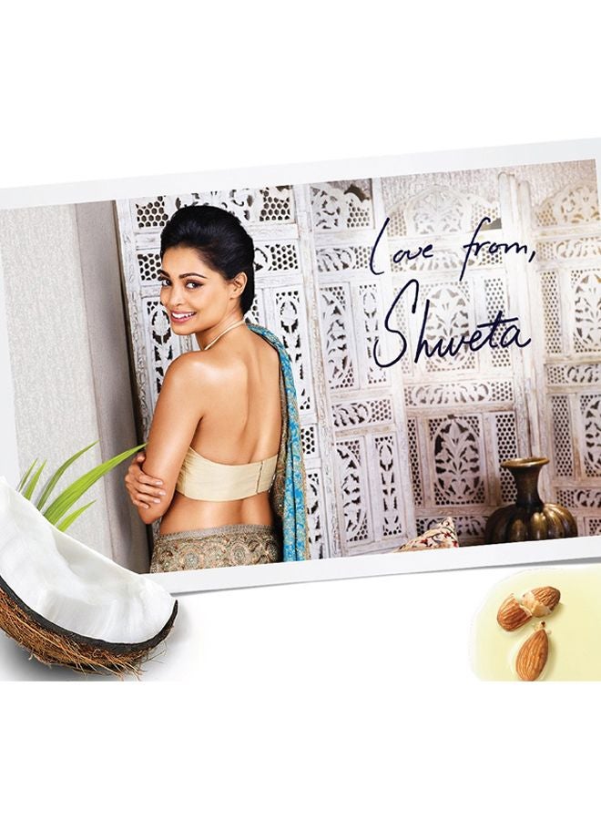 دوف لوشن الجسم نوريشينج سيكريتس بمستخلص جوز الهند لتجديد البشرة 250ملليلتر - Image 4