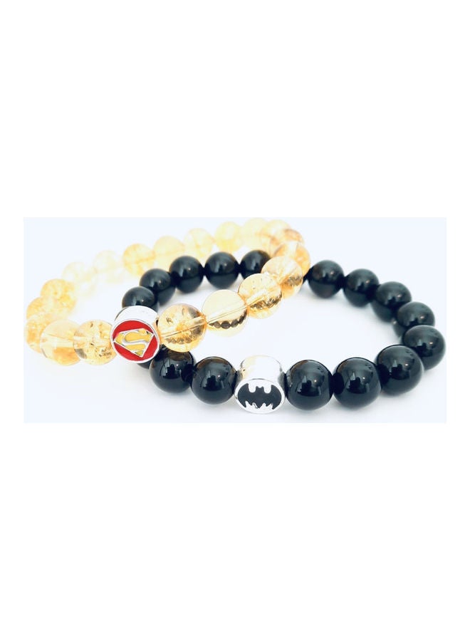 Miracle Empire 2-Piece Onyx Batman And Wonder Woman Couples Bracelet Set  - Image 1