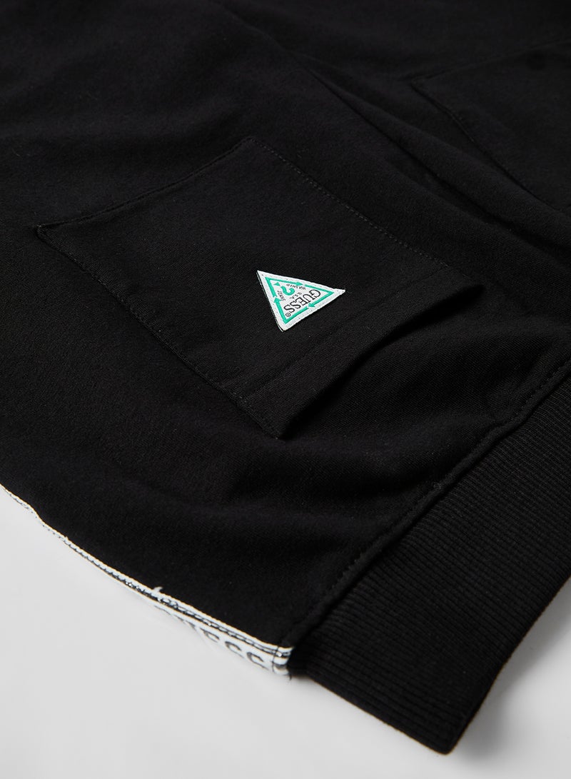 جس بنطال رياضي خفيف للركض بطبعة شعار على الجانبين أسود/ أبيض - Image 4